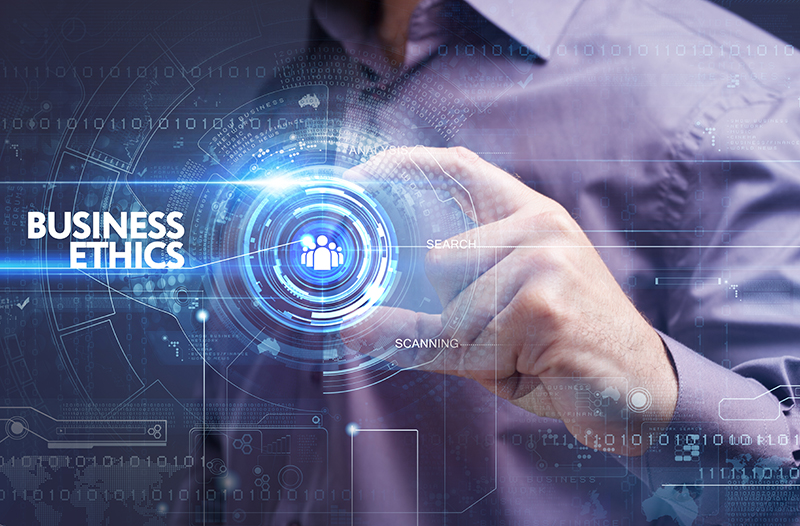 Business, Technology, Internet and network concept. Young businessman working on a virtual screen of the future and sees the inscription: business ethics